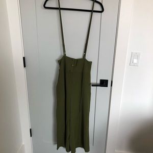 Green suspender pants